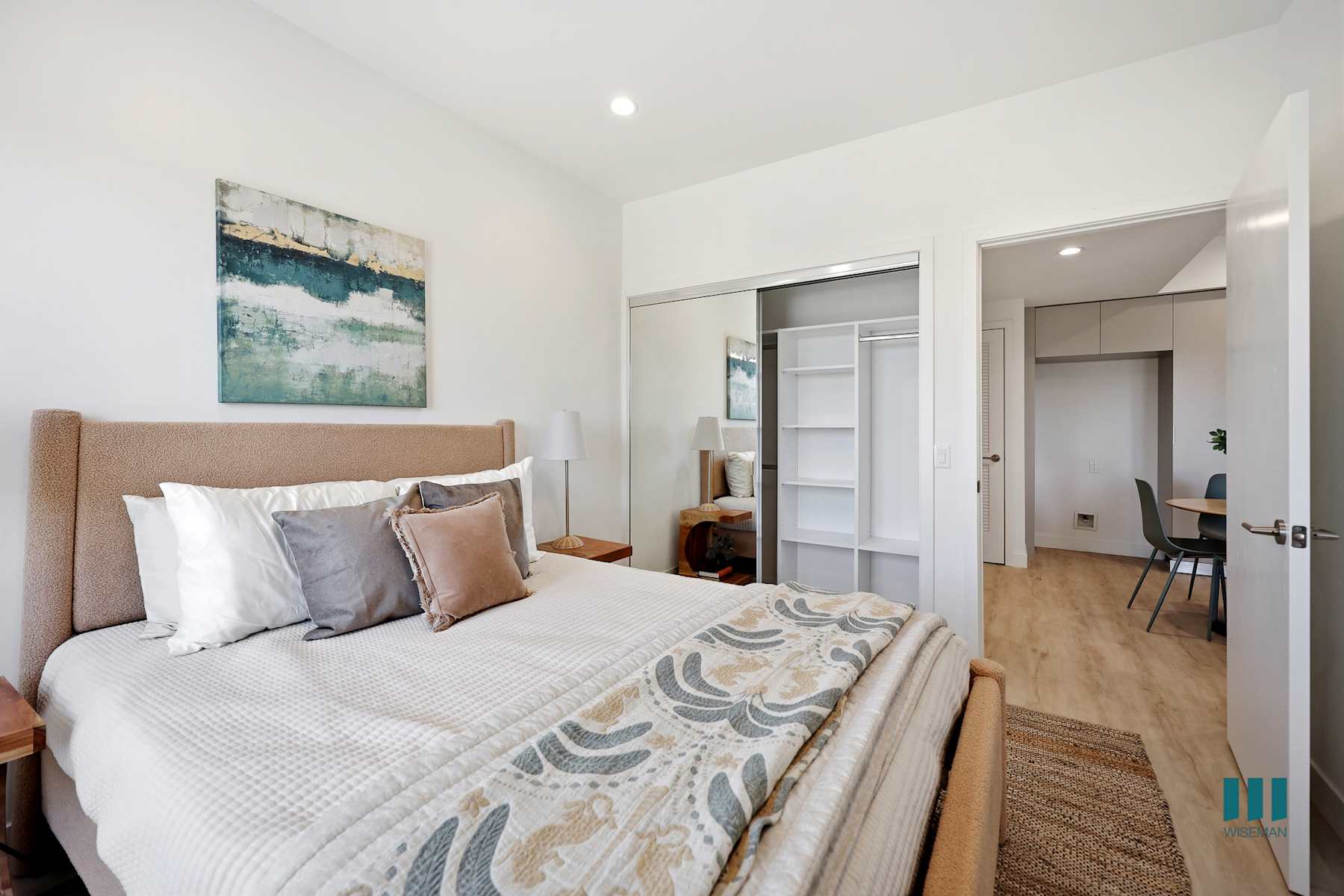 Bedroom with large window in residence 414