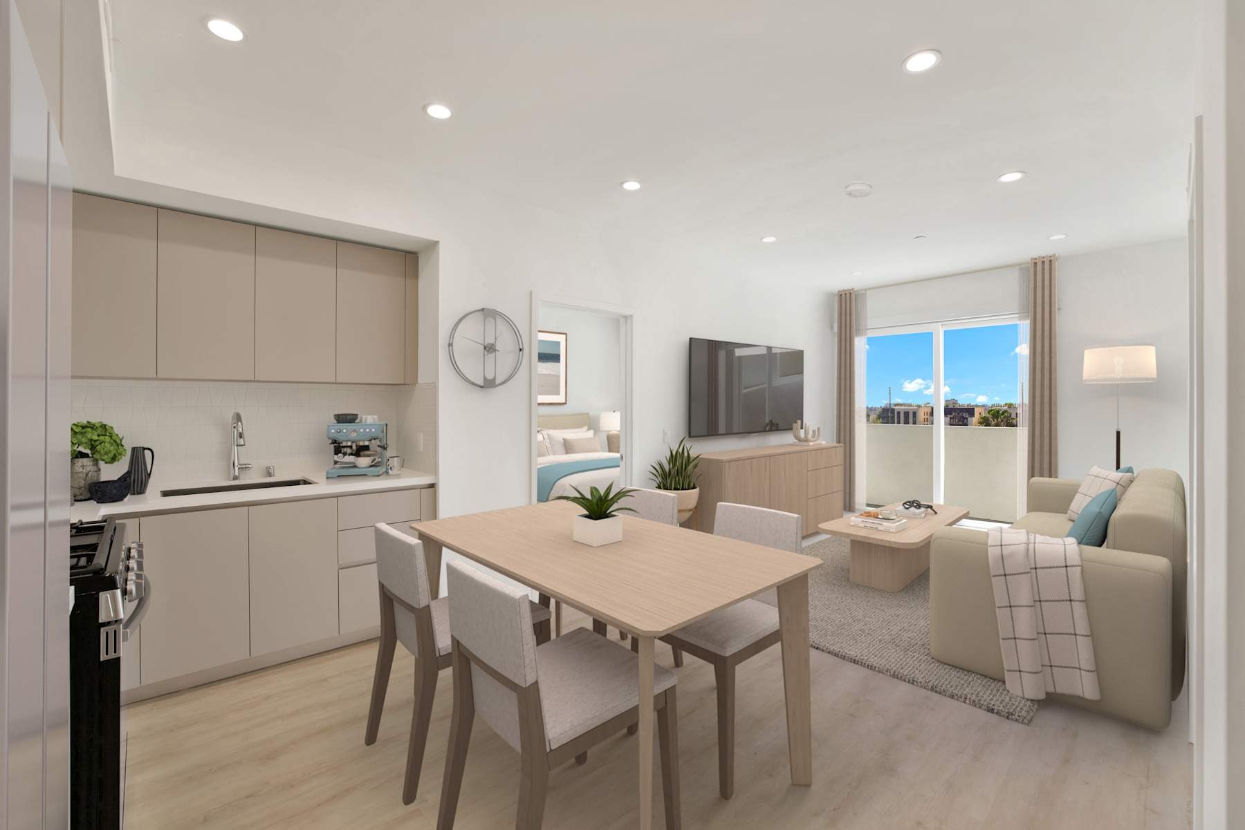 Open living and dining area with wide windows in residence 716