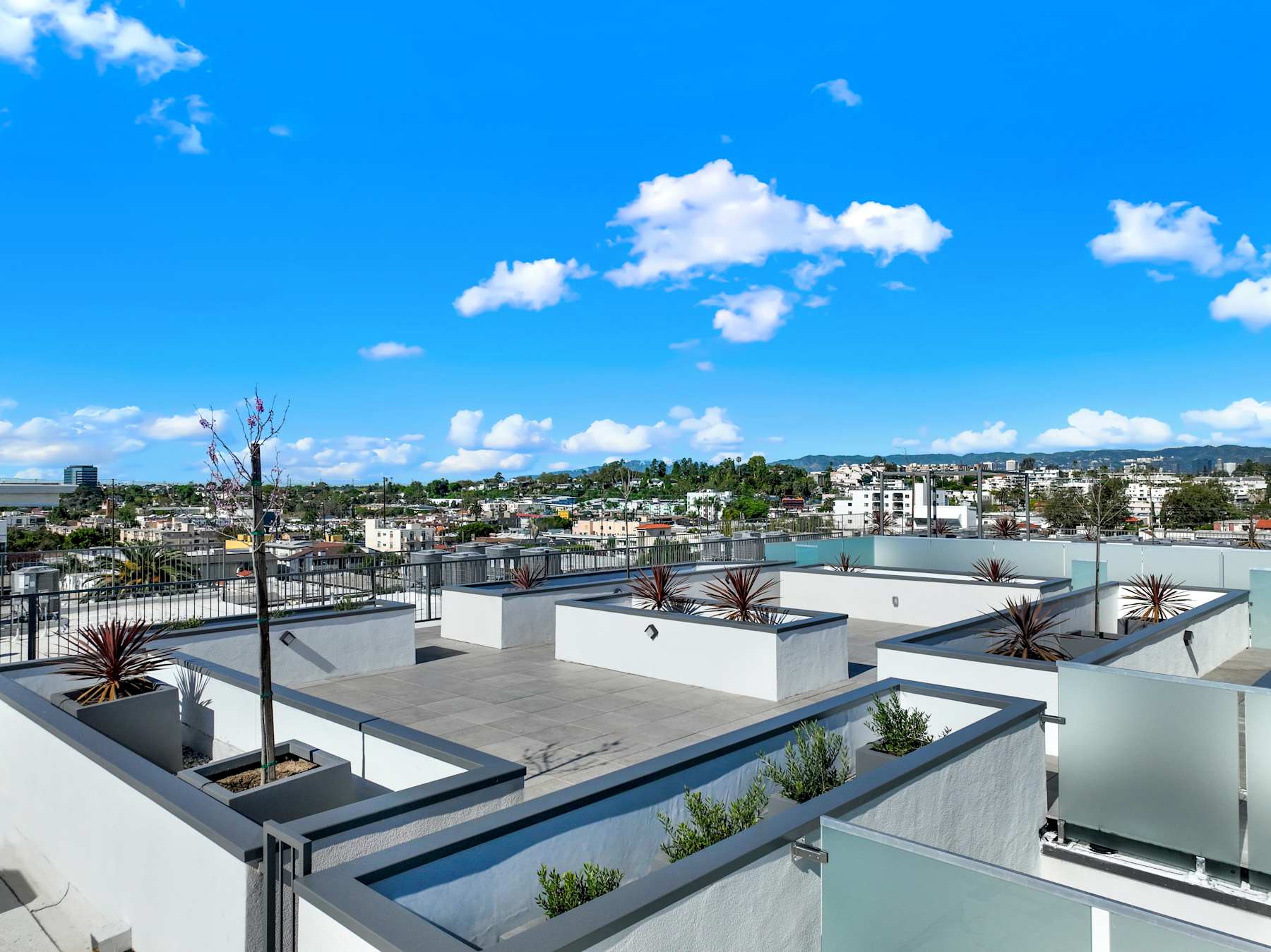 Aerial view of the Motor Tides rooftop terrace and shaded seating